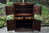 A TITCHMARSH AND GOODWIN SOLID STRESSED OAK DRINKS CABINET / WINE CUPBOARD