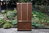 A WOOD BROTHERS OLD CHARM CARVED LIGHT OAK CANTED DISPLAY CABINET / DRESSER