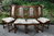 A SET OF FOUR WOOD BROTHERS OLD CHARM LIGHT OAK UPHOLSTERED DINING CHAIRS