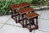 A WOOD BROTHERS OLD CHARM TUDOR BROWN OAK NEST OF THREE TABLES / COFFEE TABLE SET