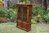 A WOOD BROTHERS OLD CHARM CARVED LIGHT OAK BOOKCASE / DISPLAY CABINET
