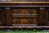 A TITCHMARSH AND GOODWIN JACOBEAN CARVED OAK DRESSER BASE / SIDEBOARD