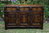 A TITCHMARSH AND GOODWIN STYLE JACOBEAN CARVED OAK DRESSER BASE / SIDEBOARD