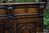 A TITCHMARSH AND GOODWIN STYLE JACOBEAN CARVED OAK DRESSER BASE / SIDEBOARD