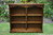 A WOOD BROTHERS OLD CHARM CARVED LIGHT OAK OPEN LOW BOOKCASE / BOOKSHELVES