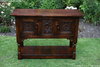 A TITCHMARSH AND GOODWIN STYLE JACOBEAN CARVED OAK DRESSER BASE / SIDEBOARD / CREDENCE CABINET