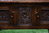 A TITCHMARSH AND GOODWIN STYLE JACOBEAN CARVED OAK DRESSER BASE / SIDEBOARD / CREDENCE CABINET