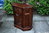 A WOOD BROTHERS OLD CHARM TUDOR BROWN CARVED OAK CANTED CABINET / CUPBOARD