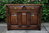 A TITCHMARSH AND GOODWIN JACOBEAN STRESSED OAK DRESSER BASE / SIDEBOARD / HALL CABINET