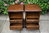 A MATCHING PAIR OF WOOD BROTHERS OLD CHARM LIGHT OAK BEDSIDE CABINETS / NIGHTSTANDS