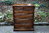 A WOOD BROTHERS OLD CHARM CARVED LIGHT OAK TALL CHEST OF DRAWERS