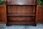 A WOOD BROTHERS OLD CHARM TUDOR BROWN CARVED OAK OPEN BOOKCASE / DISPLAY CABINET