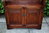 A WOOD BROTHERS OLD CHARM TUDOR BROWN CARVED OAK OPEN BOOKCASE / DISPLAY CABINET