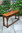 A TITCHMARSH AND GOODWIN STYLE STRESSED OAK CONSOLE / HALL TABLE