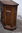 A WOOD BROTHERS OLD CHARM CARVED LIGHT OAK CANTED PEDESTAL CABINET / HALL CUPBOARD