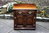 A TITCHMARSH AND GOODWIN JACOBEAN STRESSED OAK BEDSIDE CABINET / HALL CUPBOARD