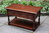 A WOOD BROTHERS OLD CHARM TUDOR BROWN CARVED OAK TWO DRAWER COFFEE TABLE