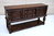 A TITCHMARSH AND GOODWIN JACOBEAN CARVED OAK DRESSER BASE / SIDEBOARD / HALL CABINET
