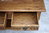 A WOOD BROTHERS OLD CHARM VINTAGE CARVED OAK TWO DRAWER COFFEE TABLE