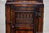 A TITCHMARSH AND GOODWIN JACOBEAN SOLID CARVED OAK MINIATURE CORNER CABINET / CUPBOARD