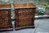 A MATCHING PAIR OF SOLID STRESSED OAK BEDSIDE CABINETS / TABLES / CHESTS OF DRAWERS / NIGHTSTANDS