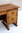 A RUPERT / NIGEL GRIFFITHS MONASTIC WOODCRAFT LTD SOLID OAK KNEEHOLE DESK / WRITING TABLE