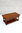 AN ANDRENA CARVED LIGHT OAK TWO DRAWER OCCASIONAL / COFFEE TABLE