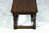 A NIGEL GRIFFITHS MONASTIC CARVED SOLID OAK COFFEE / OCCASIONAL TABLE