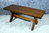 A LARGE RUPERT GRIFFITHS MONASTIC WOODCRAFT LTD CARVED SOLID OAK COFFEE TABLE