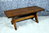 A LARGE RUPERT GRIFFITHS MONASTIC WOODCRAFT LTD CARVED SOLID OAK COFFEE TABLE