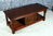 A WOOD BROTHERS OLD CHARM TUDOR BROWN CARVED OAK LONG COFFEE TABLE WITH CUPBOARD