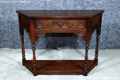 A WOOD BROTHERS OLD CHARM TUDOR BROWN CARVED OAK CANTED CONSOLE / HALL TABLE