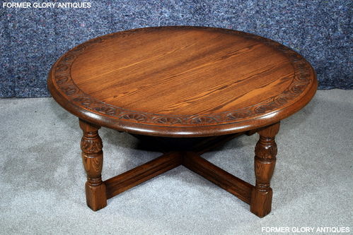 A LARGE ROUND JAYCEE AUTUMN GOLD CARVED OAK PUB COFFEE TABLE / STAND