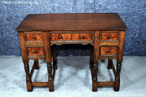 A 1920'S TITCHMARSH AND GOODWIN STYLE CARVED STRESSED OAK BURR WALNUT KNEEHOLE DESK / WRITING TABLE