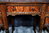 A 1920'S TITCHMARSH AND GOODWIN STYLE CARVED STRESSED OAK BURR WALNUT KNEEHOLE DESK / WRITING TABLE