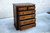 A WOOD BROTHERS OLD CHARM CARVED LIGHT OAK TALL CHEST OF SIX DRAWERS