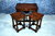 A TITCHMARSH AND GOODWIN STYLE JACOBEAN STRESSED OAK NEST OF THREE TABLES / COFFEE TABLE SET