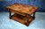 A TITCHMARSH AND GOODWIN STYLE HANDCRAFTED STRESSED OAK POTBOARD COFFEE TABLE