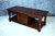 A WOOD BROTHERS OLD CHARM TUDOR BROWN CARVED OAK LONG COFFEE TABLE WITH CUPBOARD