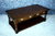 A TITCHMARSH AND GOODWIN STYLE JACOBEAN STRESSED OAK TWO DRAWER COFFEE TABLE