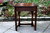 A TITCHMARSH AND GOODWIN CARVED OAK SINGLE DRAWER CANTED HALL TABLE