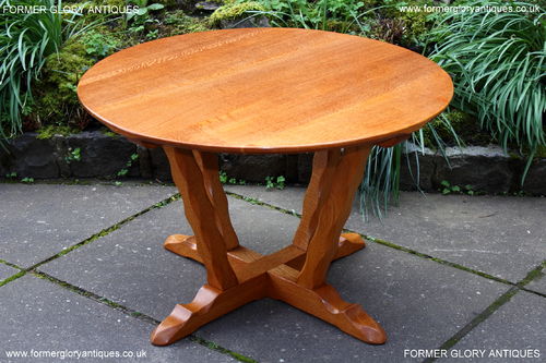 A RUPERT GRIFFITHS MONASTIC ARTS AND CRAFTS SOLID OAK ROUND COFFEE TABLE