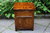 A PAIR OF WOOD BROTHERS OLD CHARM CARVED LIGHT OAK BEDSIDE TABLES / CHESTS OF DRAWERS