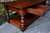 A TAYLOR & Co SOLID STRESSED OAK THREE DRAWER POTBOARD COFFEE TABLE